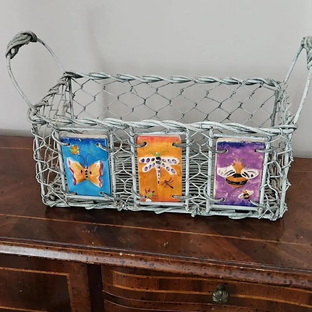 Vintage basket decorated with ceramic tiles